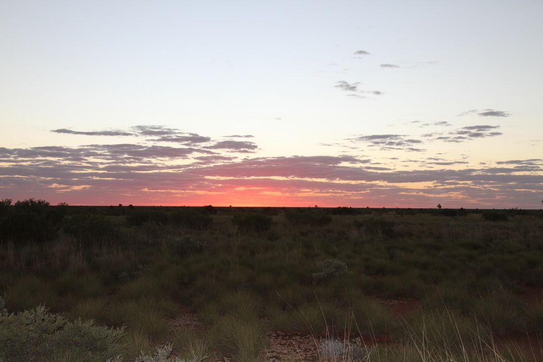 Sunset with colorful clouds on the Australian outback