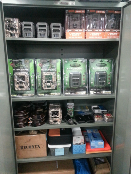 Supply cabinet full of many types of train cameras and locks